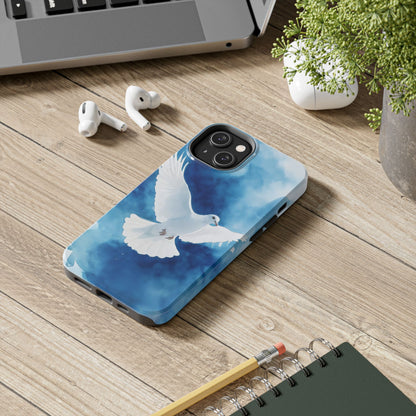 Phone case with white dove artwork on blue background, displayed on wooden desk with accessories