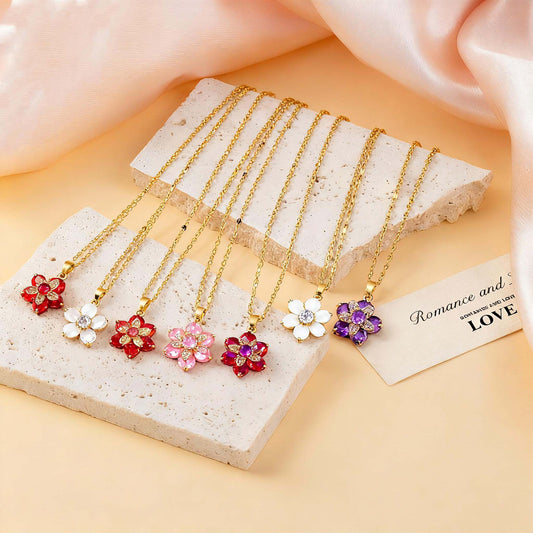 Colored flower pendant necklaces arranged side by side
