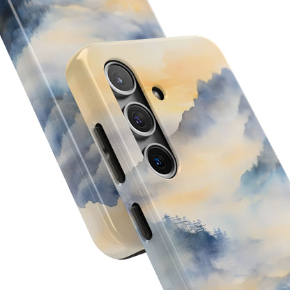 Phone case with pastel watercolor mountain and sky design, close-up view