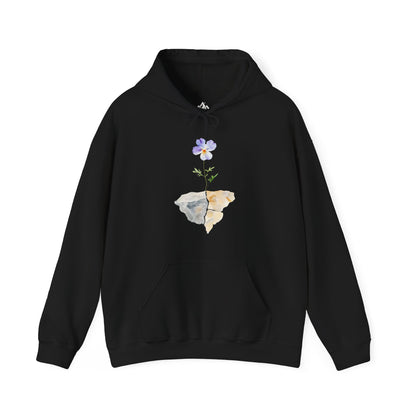 Black hoodie with watercolor flower sprouting from cracked rocks, Christian mindful apparel