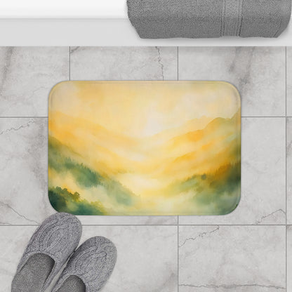 Bathroom floor mat with yellow and green watercolor mountain landscape design on tile