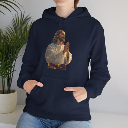 Navy blue hoodie featuring praying Jesus graphic, Christian faith apparel, worn by woman indoors