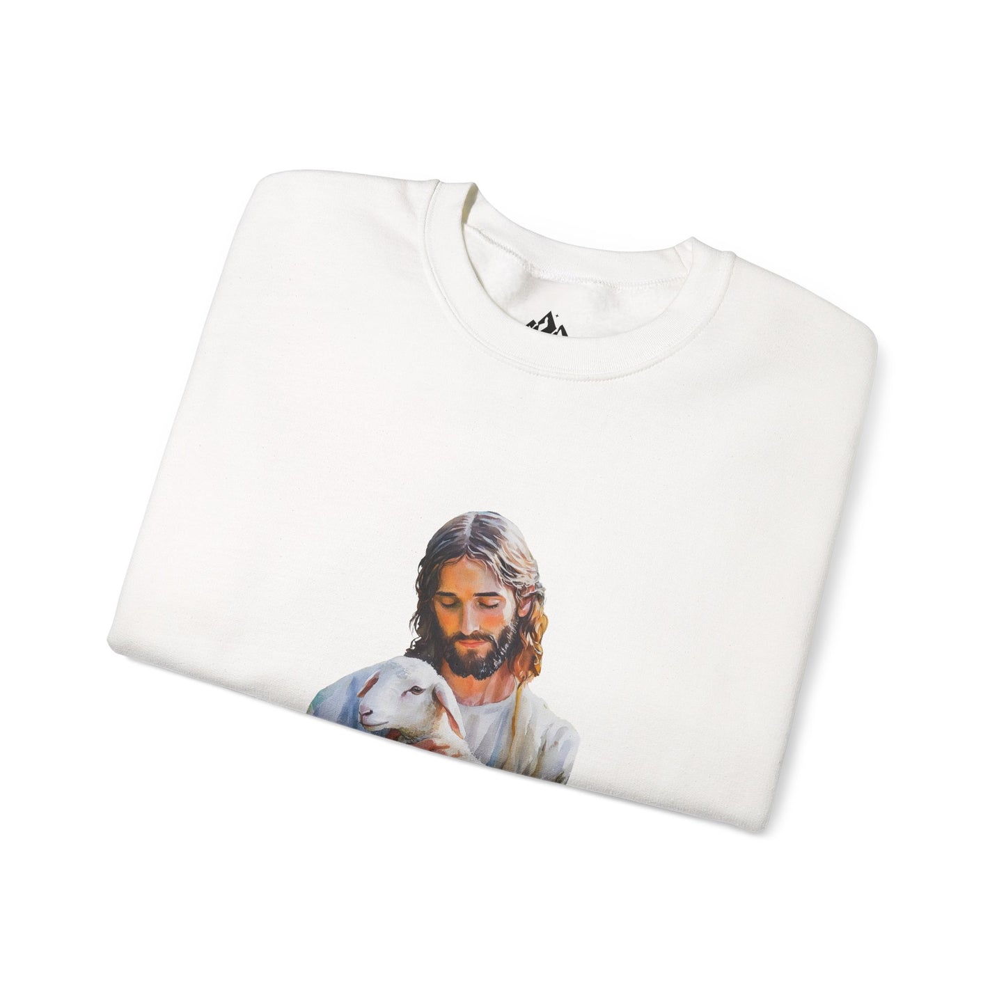 Folded white Christian sweatshirt with peaceful Jesus artwork holding a lamb