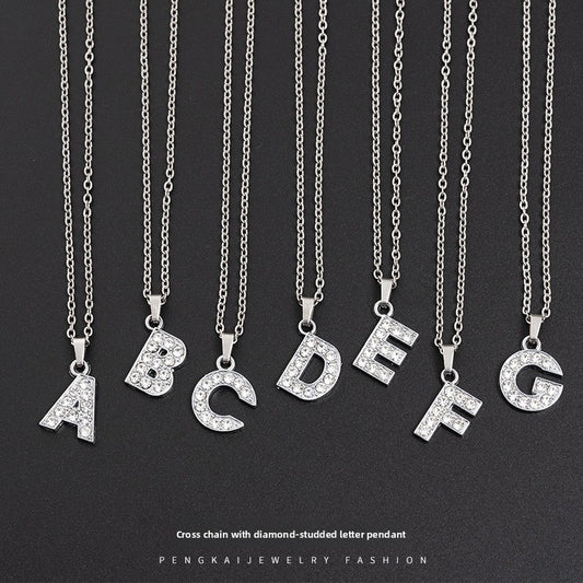 Silver-tone alphabet letter pendants displayed together