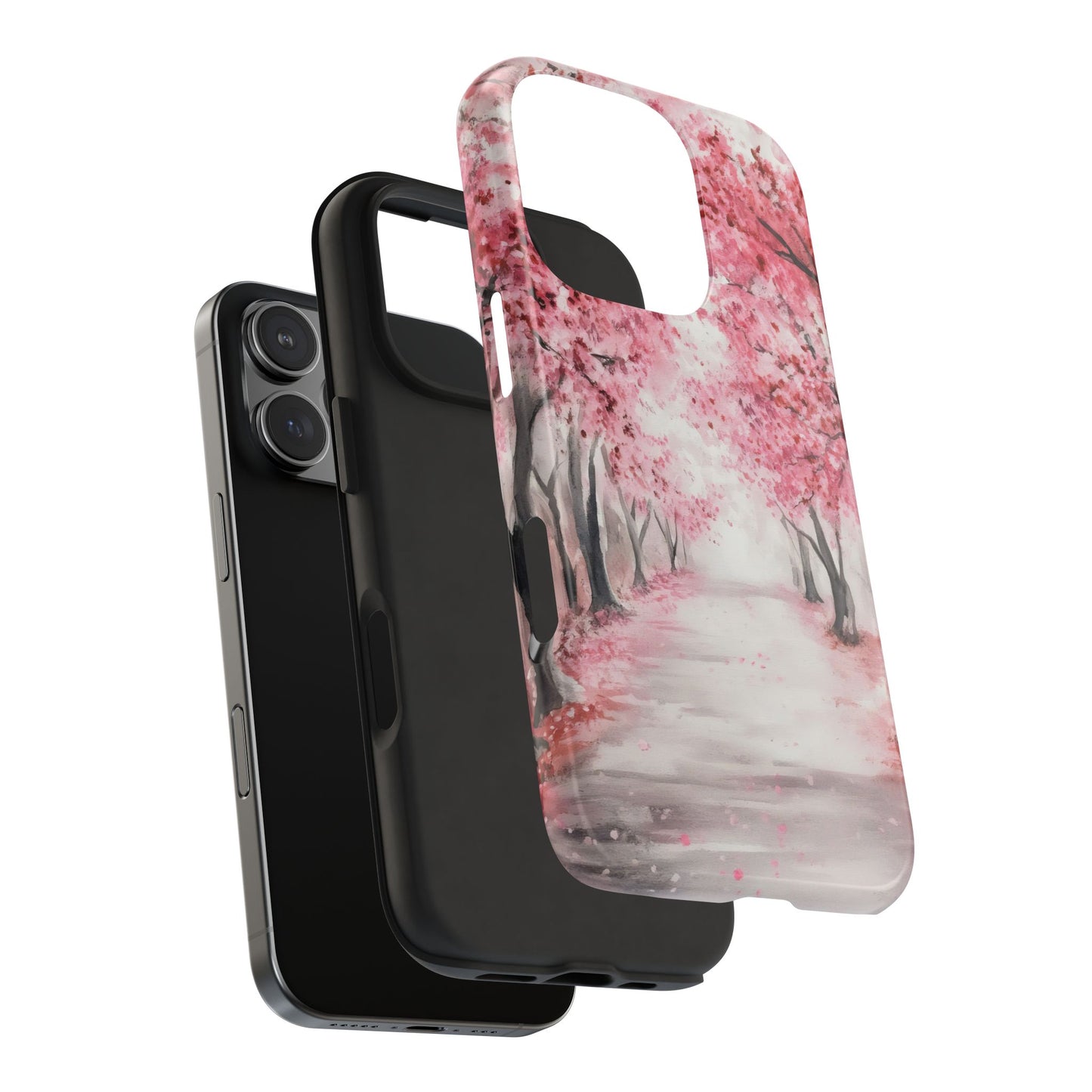 iPhone case with pink cherry blossom path design, layered over a phone and black case