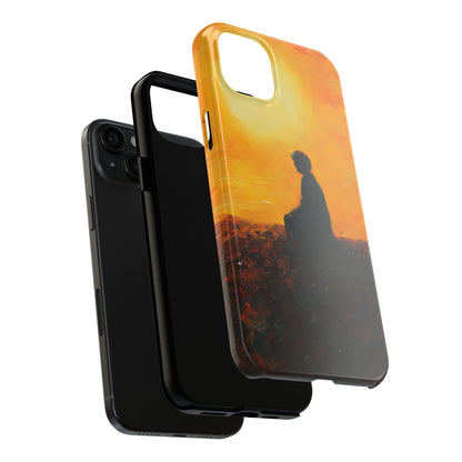 Phone case with silhouette of a person meditating at sunset, spiritual art design