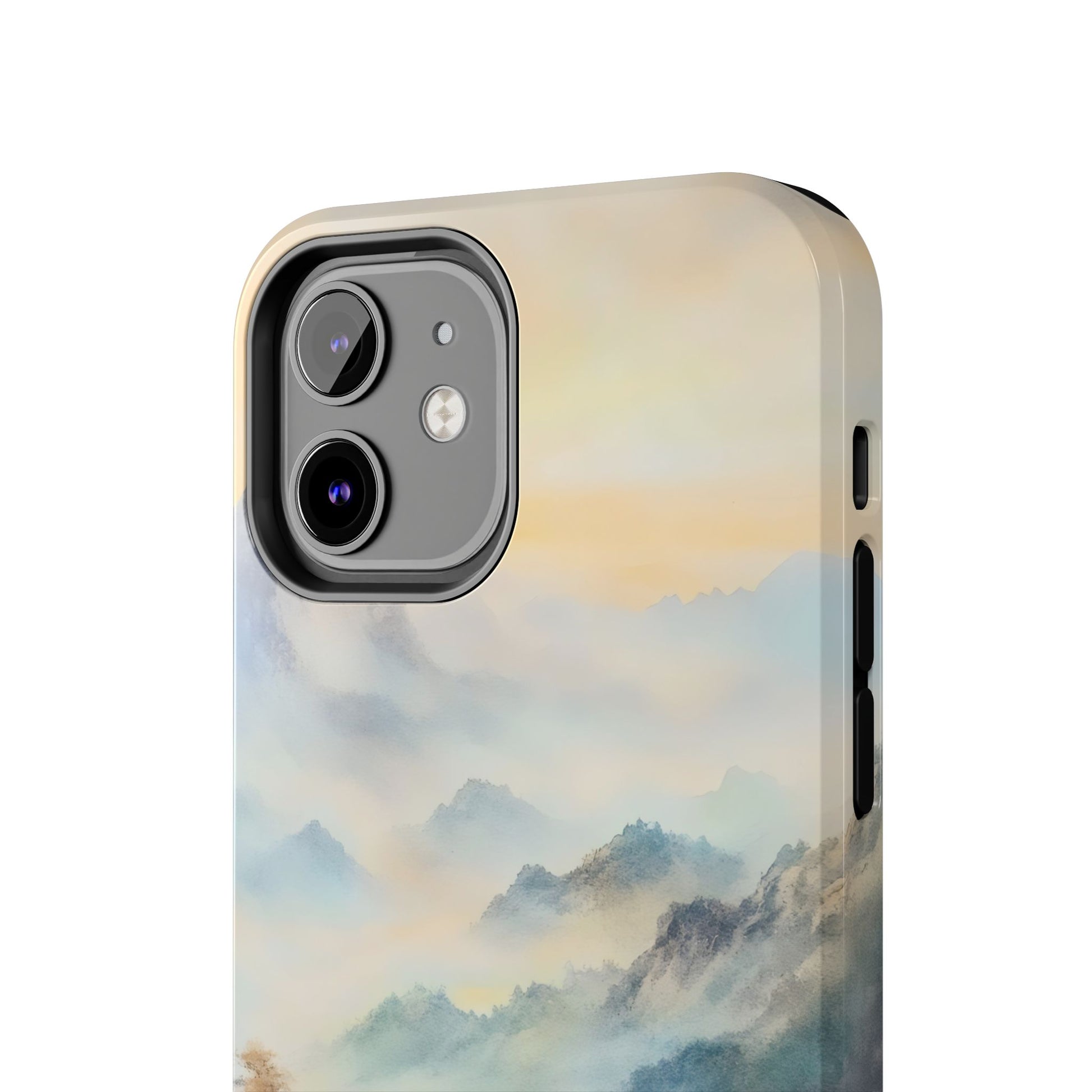 iPhone case with serene pastel mountain landscape and misty sky design
