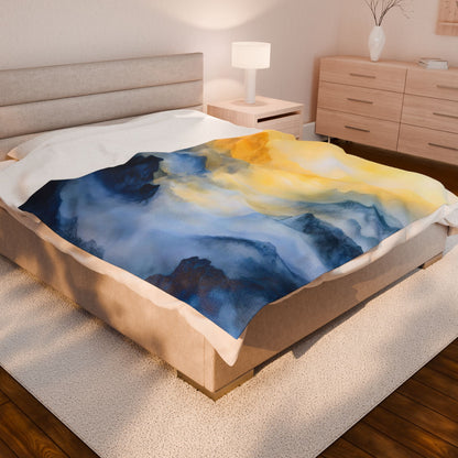 Abstract blue and yellow throw blanket on modern bed in cozy bedroom