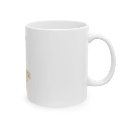 White ceramic mug with partial floral design on a plain background