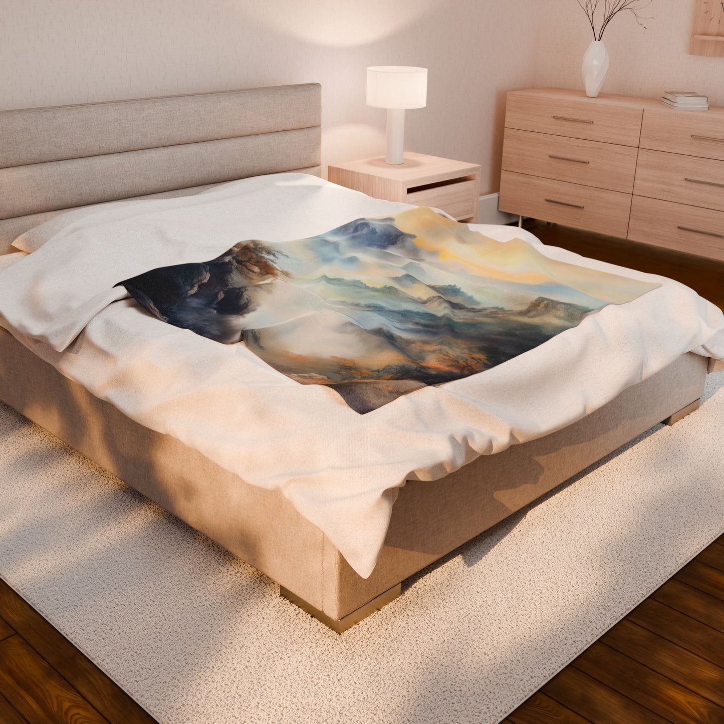 Cozy bedroom with a bed featuring a serene mountain landscape blanket and modern decor