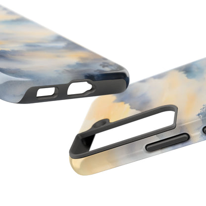 Abstract watercolor phone case in soft blue and yellow tones, close-up view