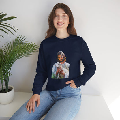 Woman wearing navy sweatshirt with Jesus holding a lamb graphic, sitting indoors by plant