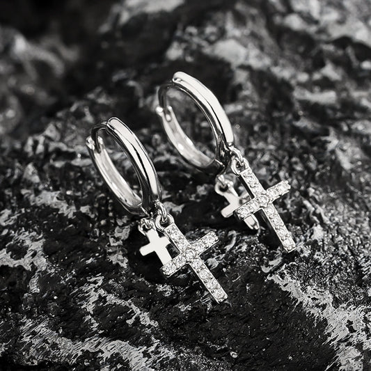 Silver-tone hoop earrings with dangling crystal cross charms