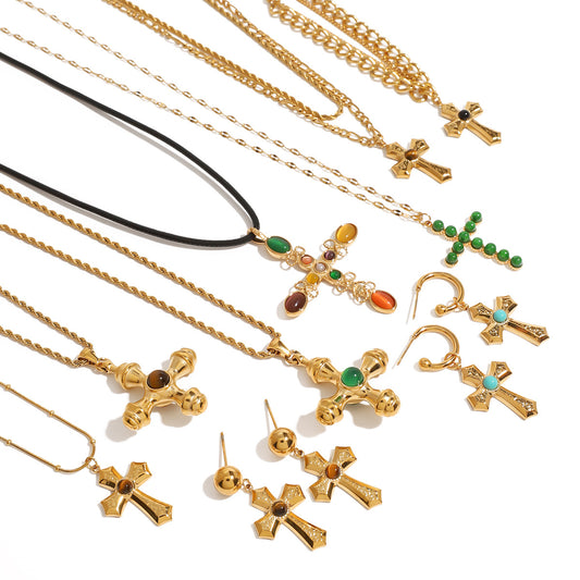 Cross necklace and ring designs shown together
