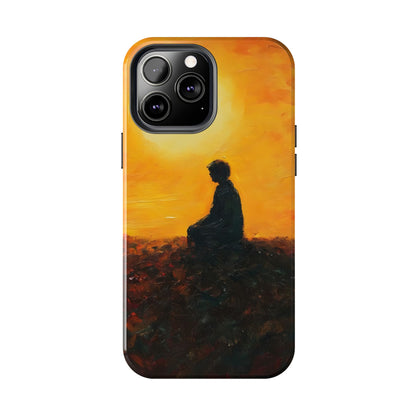 Phone case with silhouette of person meditating at sunset, spiritual and calming design