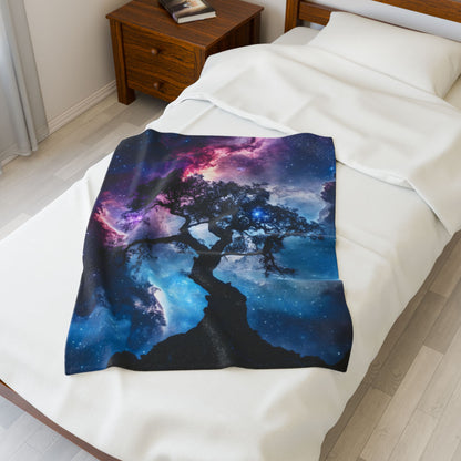 Galaxy tree art throw blanket on bed with nightstand and book, cosmic home decor