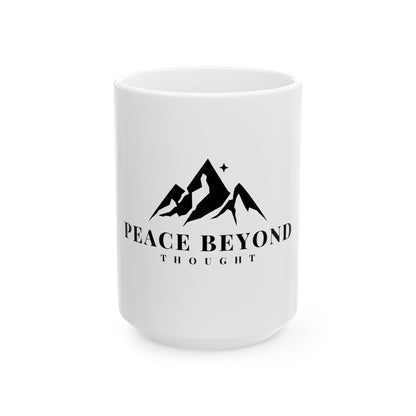 White ceramic mug with black mountain graphic and inspirational 'Peace Beyond Thought' text.