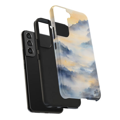 Samsung phone with a layered case showing serene mountain landscape in soft pastel colors