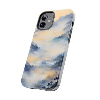 Phone case with serene watercolor mountain landscape and misty sky design