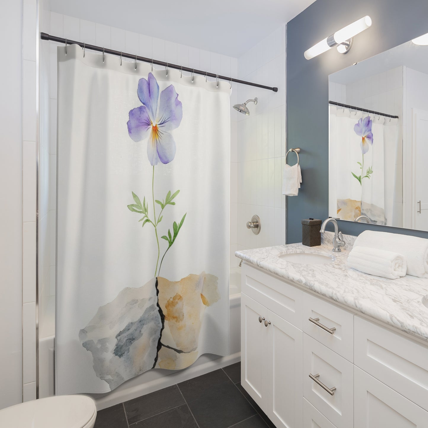 Bathroom with white vanity and a shower curtain featuring a purple flower growing from stone