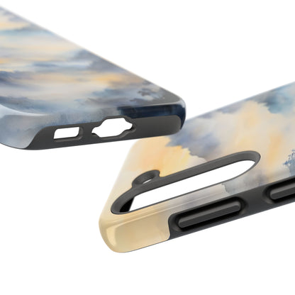 Close-up of two phone cases with a serene abstract cloud and sky design in soft pastel colors.
