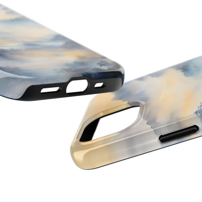 Close-up of two pastel watercolor abstract phone cases with soft blue and yellow tones