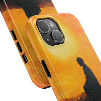 Phone case with silhouette of a meditating figure against a golden yellow sunset background