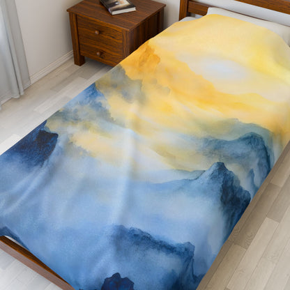 Watercolor mountain and sunrise duvet cover on a wooden bed in a serene bedroom