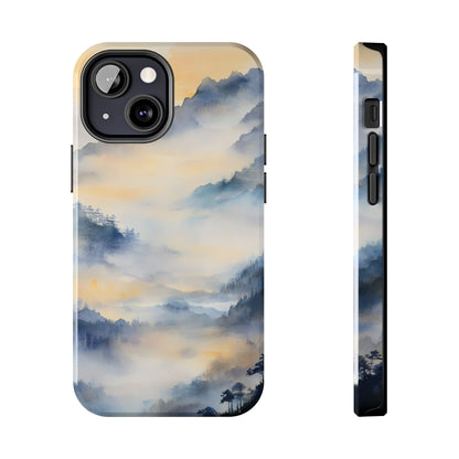 Phone case with serene misty mountain landscape and tranquil blue-orange sky design