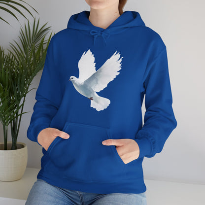 Woman wearing blue hoodie with white dove graphic, faith-inspired apparel