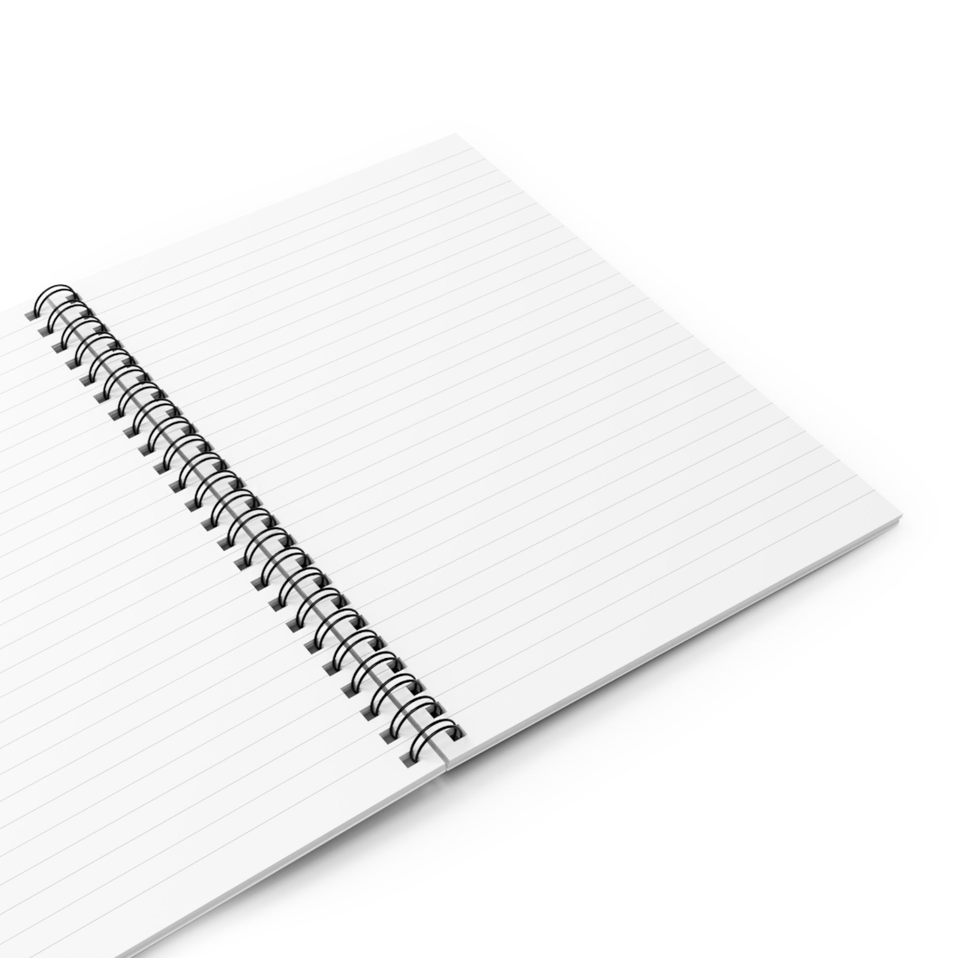 Open spiral-bound lined notebook for mindful journaling or spiritual reflection