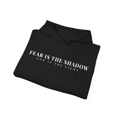Black Christian hoodie with 'Fear Is The Shadow God Is The Light' printed in white text