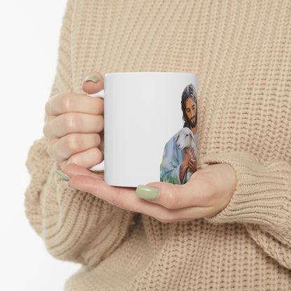 Woman holding white ceramic mug with Jesus and lamb Christian wall art design