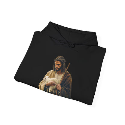 Black Christian hoodie featuring Jesus holding a lamb, faith-inspired apparel design