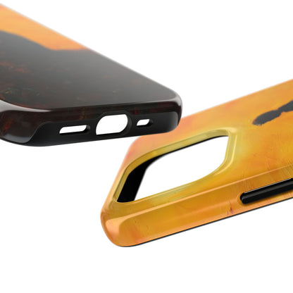 Close-up of two protective phone cases with abstract orange and black artistic design