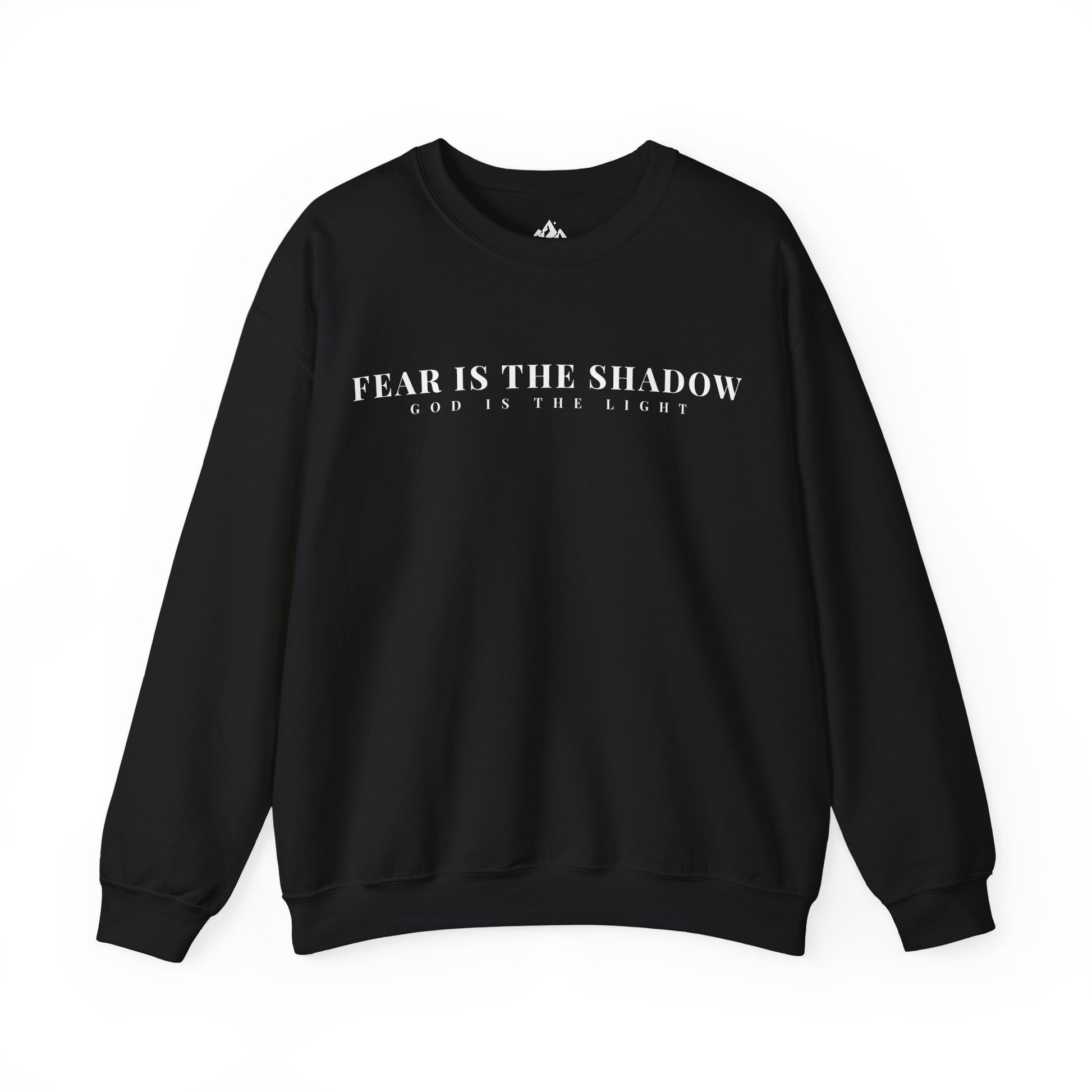 Black Christian sweatshirt with 'Fear is the shadow, God is the light' faith-inspired text.