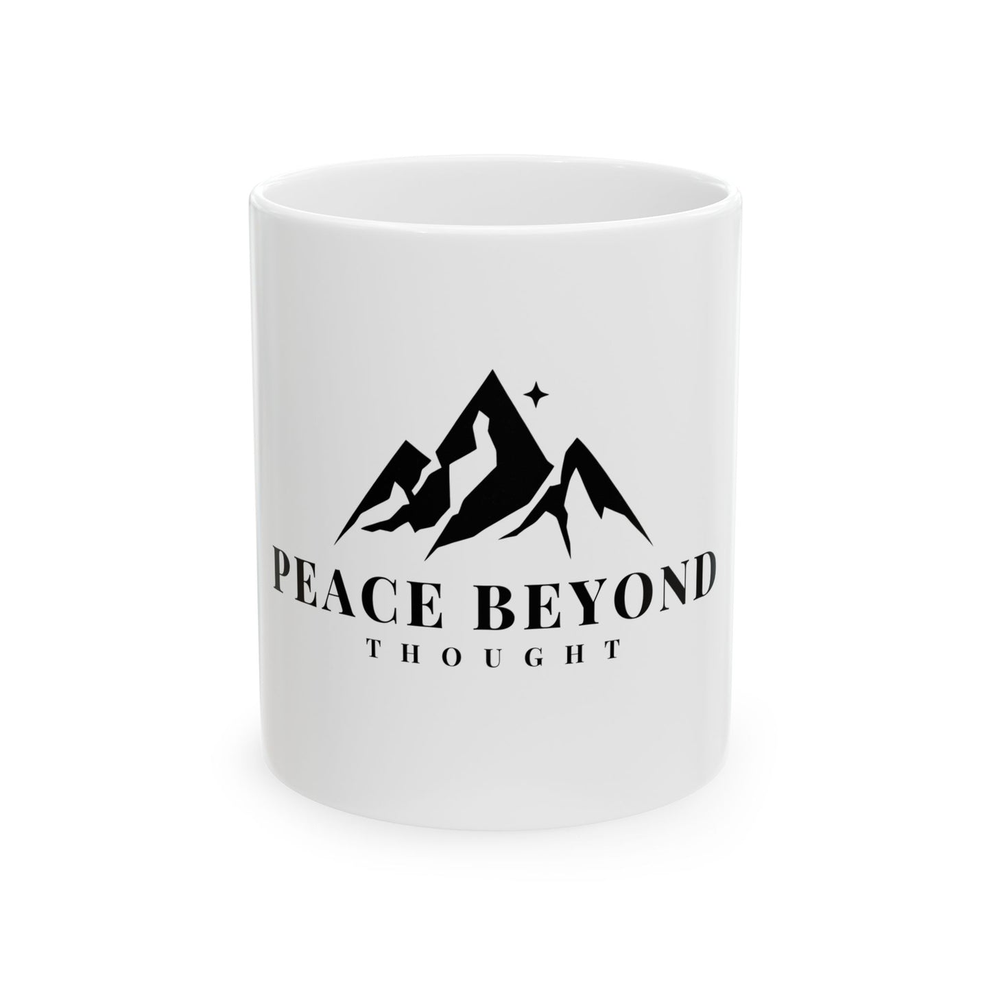 White ceramic mug with black mountain graphic and 'Peace Beyond Thought' text
