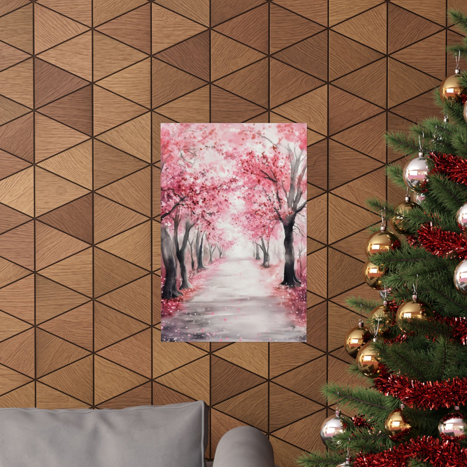 Cherry blossom wall art on geometric wood wall near decorated Christmas tree