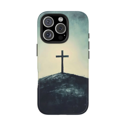 Christian phone case featuring a painted cross on a hill with a serene, spiritual backdrop