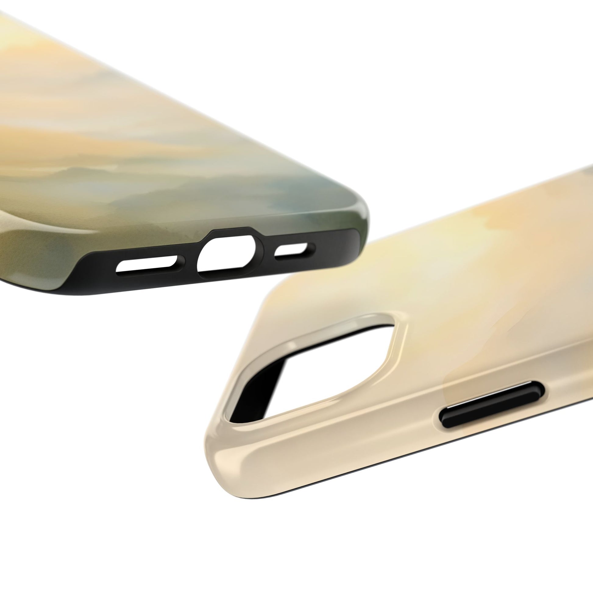 Close-up of glossy phone cases with abstract pastel design on white background