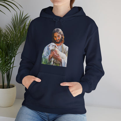 Navy hoodie with Jesus holding lamb graphic, worn by woman in casual indoor setting