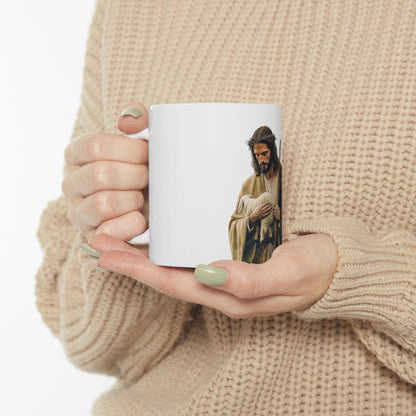 Woman holding white mug featuring Jesus with a lamb, Christian faith wall art inspired design