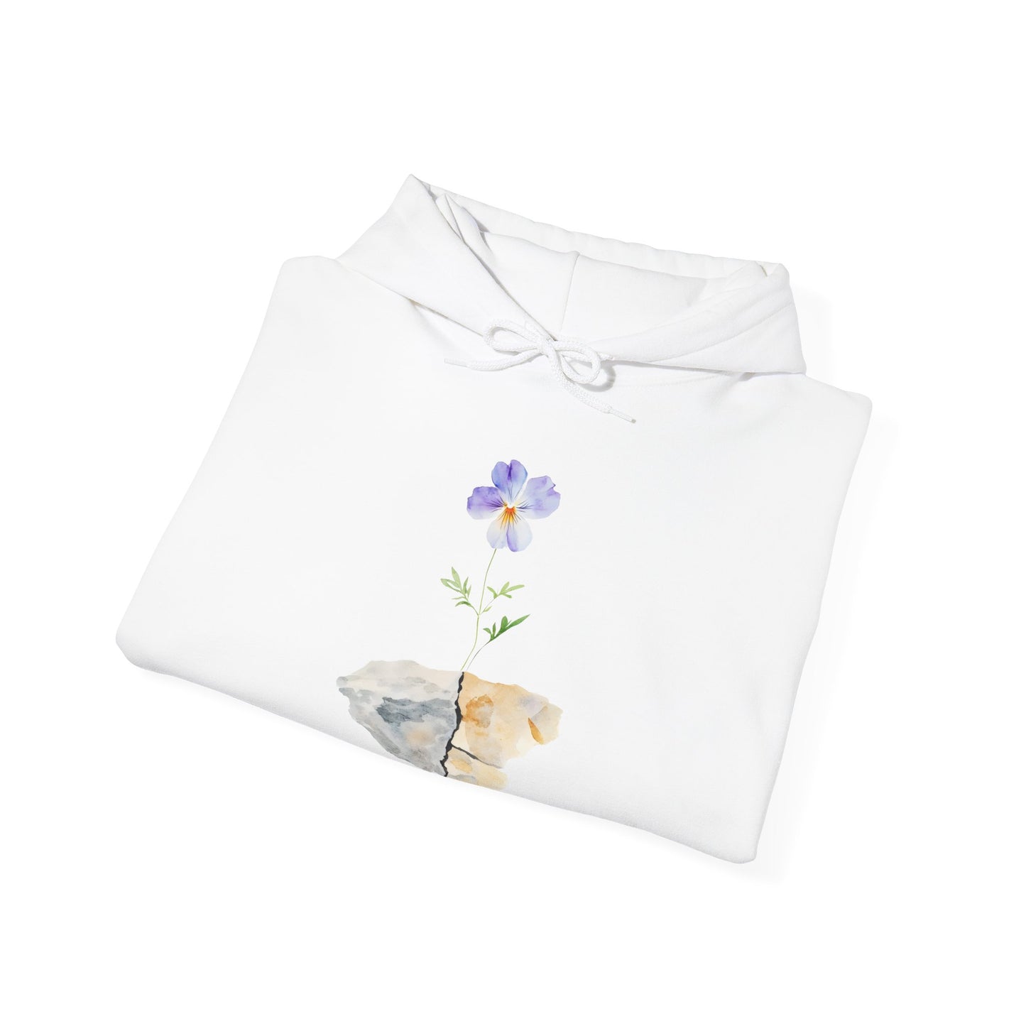 White hoodie with watercolor purple flower growing from cracked stone design, folded on white background