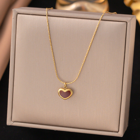 Small heart pendant necklace with dark center detail